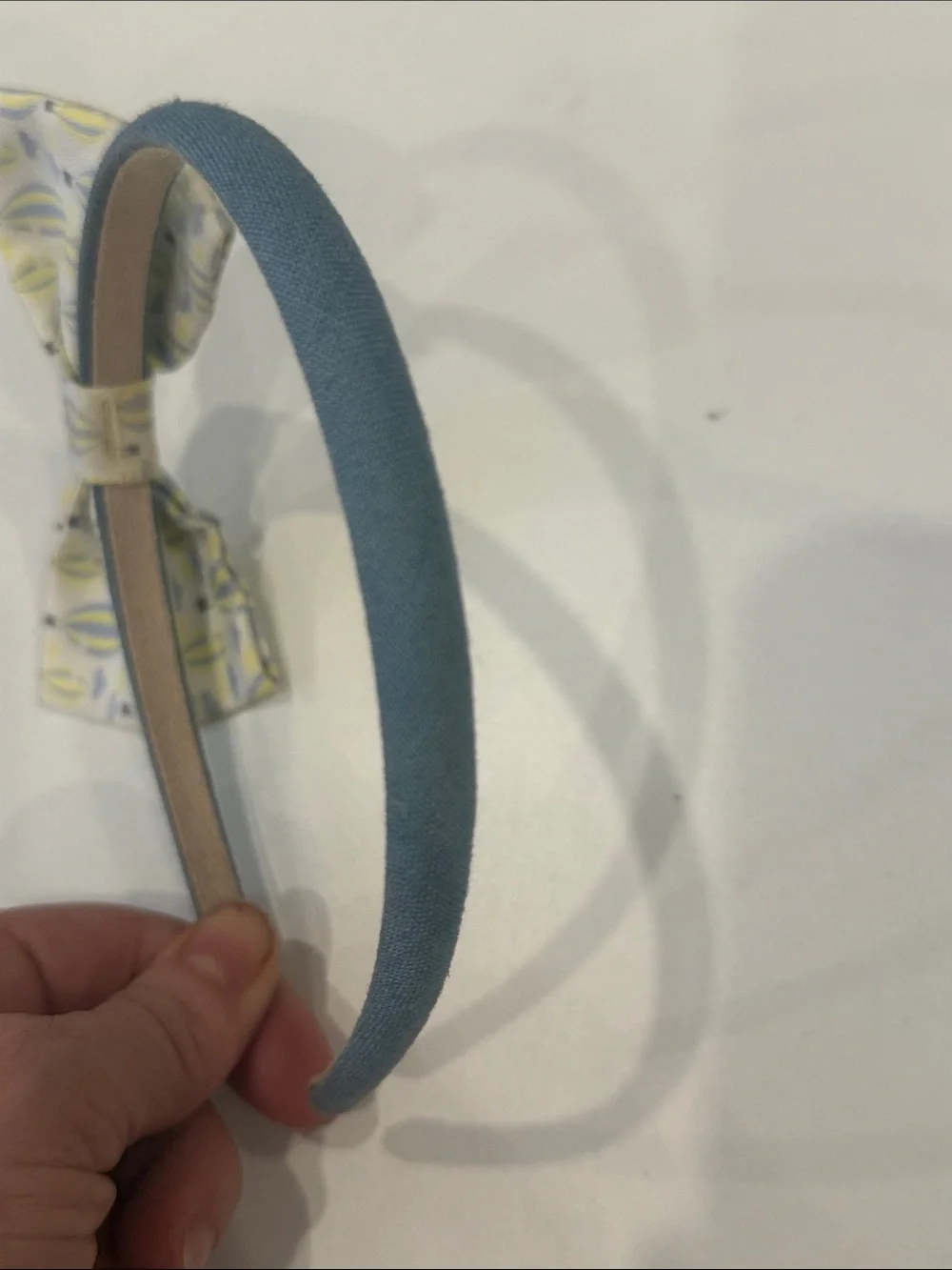 Blue Fabric Headband with Patterned Yellow Bow Accent
